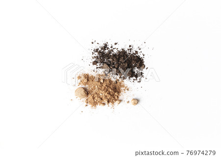 Isolated light and dark brown face or eye shadow on white background Isolated light and dark brown face or eye shadow on white background 76974279