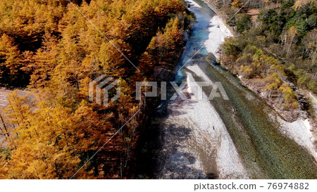 Azusa River autumn leaves in Kamikochi 76974882