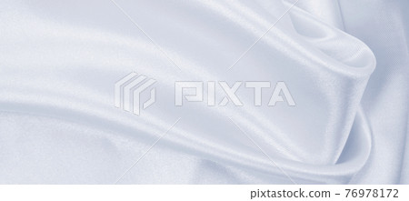 Smooth elegant grey silk or satin luxury cloth as wedding background. Luxurious background design Smooth elegant grey silk or satin luxury cloth as wedding background. Luxurious background design 76978172