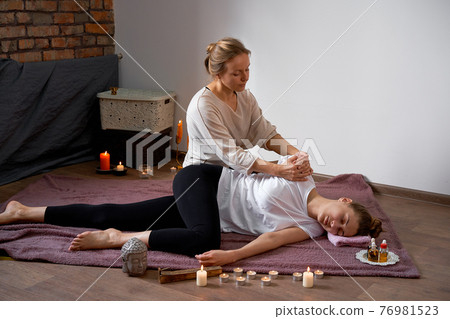 Relax and enjoy in spa salon, getting thai massage by professional masseur. 76981523