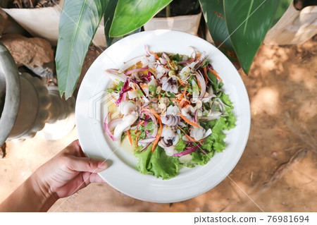 spicy salad or spicy squid salad 76981694