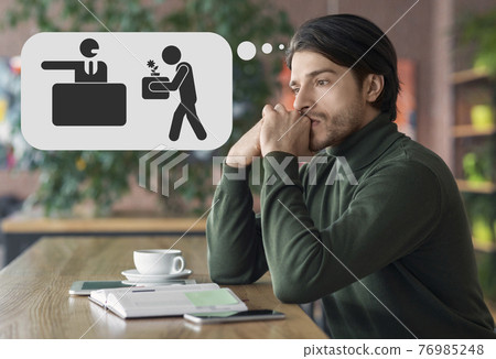 Frustrated young man thinking about losing job, having career problems, sitting at cafe, wrapped up in painful memories Frustrated young man thinking about losing job, having career problems, sitting at cafe, wrapped up in painful memories 76985248