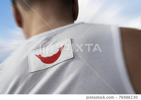 The national flag of Easter Island on the athlete's back The national flag of Easter Island on the athlete's back 76986130
