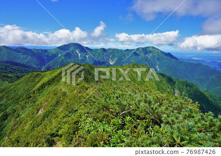 Mt. Nakanodake and Mt. Echigo Komagatake from the summit of Mt. Arasawa Mt. Nakanodake and Mt. Echigo Komagatake from the summit of Mt. Arasawa 76987426