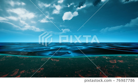 underwater view with horizon and water surface split by waterline underwater view with horizon and water surface split by waterline 76987786