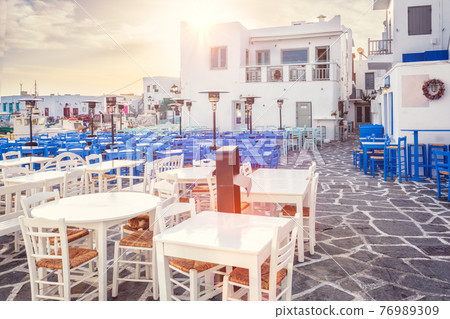 Picturesque Naousa town street on Paros island, Greece Picturesque Naousa town street on Paros island, Greece 76989309