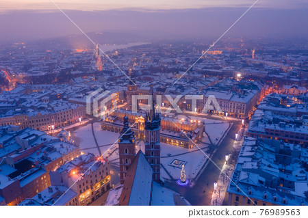 Main square Rynek of the Old Town of Krakow Poland in winter aerial view. Main square Rynek of the Old Town of Krakow Poland in winter aerial view. 76989563