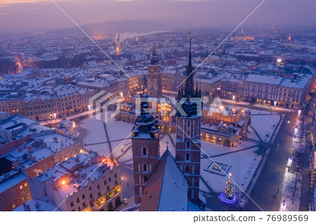Main square Rynek of the Old Town of Krakow Poland in winter.  76989569