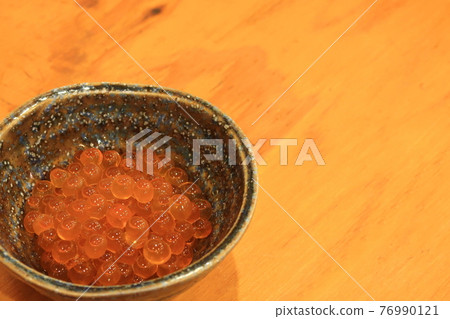 Salmon roe in a small plate Salmon roe in a small plate 76990121
