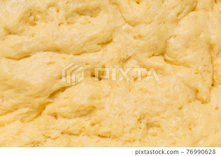 beautiful texture of yellow butter yeast dough, macro shot beautiful texture of yellow butter yeast dough, macro shot 76990628