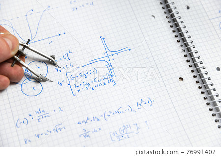 Math handwriting in notebook closeup Math handwriting in notebook closeup 76991402