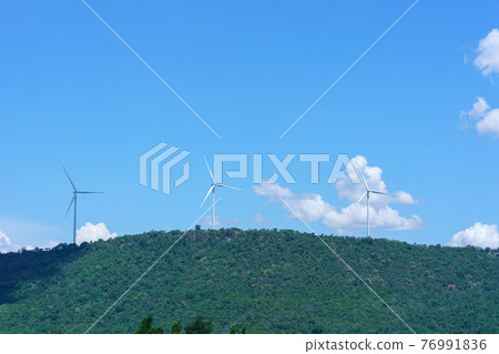 Wind turbine renewable energy source summer in forest mountains landscape energy transmission distribution equipment in natural environment Wind turbine renewable energy source summer in forest mountains landscape energy transmission distribution equipment in natural environment 76991836