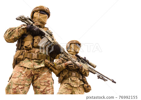 Two equipped special forces soldiers isolated on white background Two equipped special forces soldiers isolated on white background 76992155
