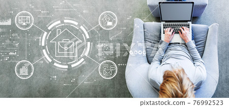 Telework theme with man using a laptop Telework theme with man using a laptop 76992523