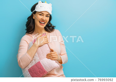woman is wearing sleepwear woman is wearing sleepwear 76993092