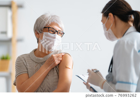 Senior woman after vaccination. Senior woman after vaccination. 76993262