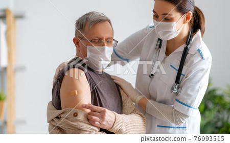 Senior man after vaccination. 76993515