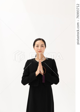 Middle woman funeral gassho Middle woman funeral gassho 76993712