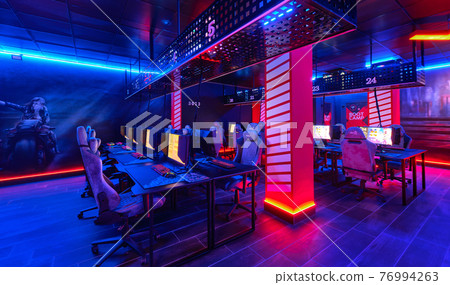 Inside of modern internet cybercafe, no people 76994263