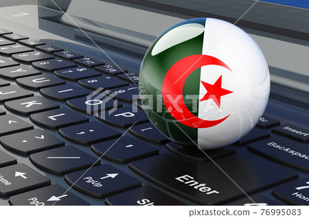 Algerian flag on laptop keyboard. Online business, education, shopping in Algeria concept. 3D rendering 76995083