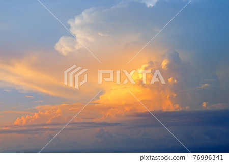 Beautiful sunset. Blue sky and clouds. 76996341