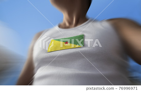 The national flag of French Guiana on the athlete's chest 76996971