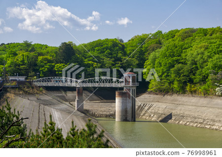 Intake tower of Yamagami Reservoir, a fresh green village of drought, Lake Tama, a water tank in Tokyo 76998961