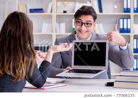 Business meeting between businessman and businesswoman Business meeting between businessman and businesswoman 77006155