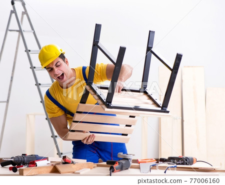Floor repairman disappointed with his work Floor repairman disappointed with his work 77006160