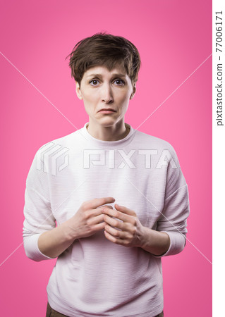 Why is that. Beautiful female half-length portrait isolated on trendy pink studio backgroud. Why is that. Beautiful female half-length portrait isolated on trendy pink studio backgroud. 77006171