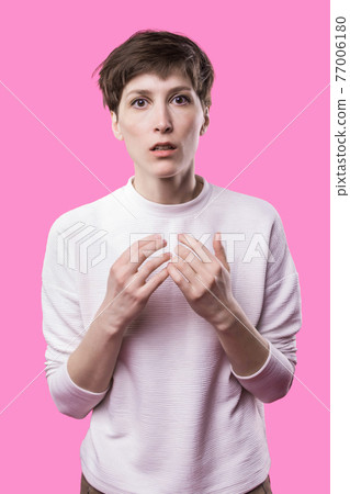 Why is that. Beautiful female half-length portrait isolated on trendy pink studio backgroud. Why is that. Beautiful female half-length portrait isolated on trendy pink studio backgroud. 77006180
