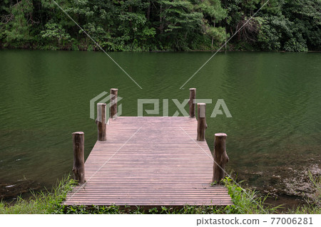 Bridge against lake and forest Nature background at Pang Oung, Mae Hong Son, Thailand. travel, outdoor, natural and vacation concept Bridge against lake and forest Nature background at Pang Oung, Mae Hong Son, Thailand. travel, outdoor, natural and vacation concept 77006281