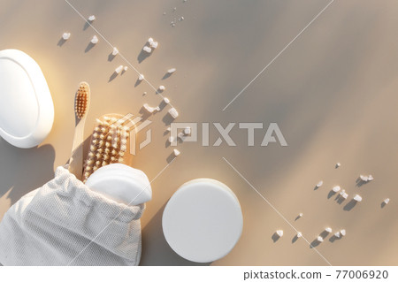 Bath accessories flat lay on beige background. Natural body care concept 77006920