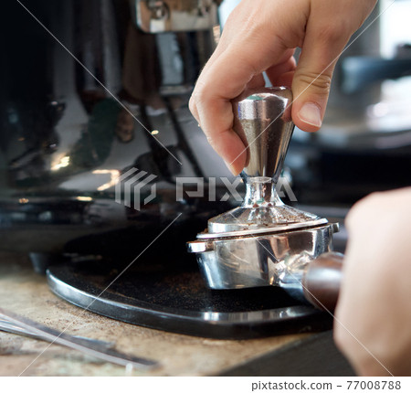 Barista making fresh espresso coffee. Espresso Machine Portafilters (Closeup). Barista making fresh espresso coffee. Espresso Machine Portafilters (Closeup). 77008788