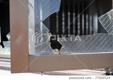 Broken window glass Broken window glass 77009524