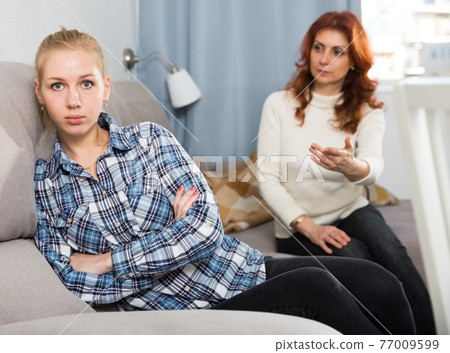 Mom points her daughter to her faults. Mom points her daughter to her faults. 77009599