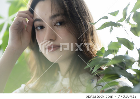 Botanical women's beauty portrait Botanical women's beauty portrait 77010412