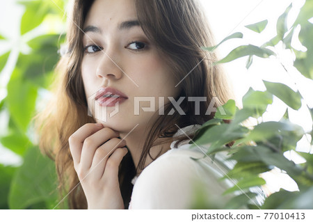 Botanical women's beauty portrait Botanical women's beauty portrait 77010413