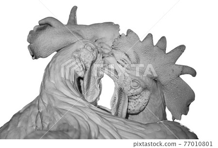 Statue of two cock fight. Stone sculpture of rooster battle isolated on white background. Ancient art decoration 77010801