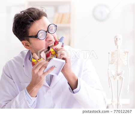 Crazy doctor with heart model 77012267