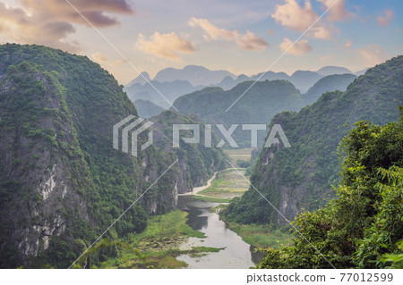 Trang An, Tam Coc, Ninh Binh, Viet nam. It's is UNESCO World Heritage Site, renowned for its boat cave tours. It's Halong Bay on land of Vietnam. Vietnam reopens borders after quarantine Coronovirus Trang An, Tam Coc, Ninh Binh, Viet nam. It's is UNESCO World Heritage Site, renowned for its boat cave tours. It's Halong Bay on land of Vietnam. Vietnam reopens borders after quarantine Coronovirus 77012599