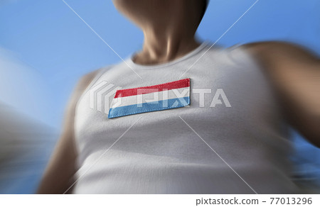 The national flag of Luxembourg on the athlete's chest The national flag of Luxembourg on the athlete's chest 77013296