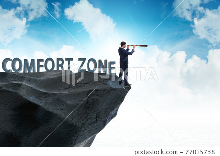 Businessman in the concept of stepping out of comfort zone Businessman in the concept of stepping out of comfort zone 77015738