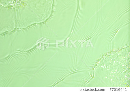 green transparent clear water surface texture summer background green transparent clear water surface texture summer background 77016441