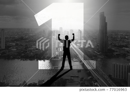 Double exposure silhouette of man standing inside number one with fists raising up over the city background Double exposure silhouette of man standing inside number one with fists raising up over the city background 77016963