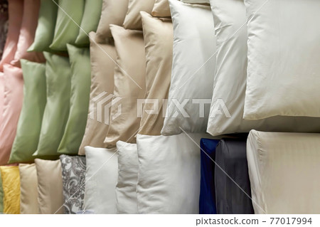 Background of colorful pillows for sale in a shop window 77017994