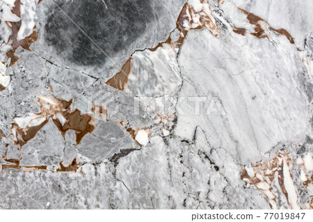 A background of peeling paint and rusty old stone. A background of peeling paint and rusty old stone. 77019847