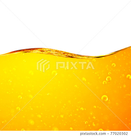 Liquid yellow wave line. Gold bubbles of air. For the project, gold, rest, oil, honey, beer, juice, shampoos or other successful options. On white background an area for text from above Liquid yellow wave line. Gold bubbles of air. For the project, gold, rest, oil, honey, beer, juice, shampoos or other successful options. On white background an area for text from above 77020302