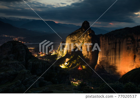Meteora rock formation in Kalambaka, Greece at night: a geological phenomen Meteora rock formation in Kalambaka, Greece at night: a geological phenomen 77020537