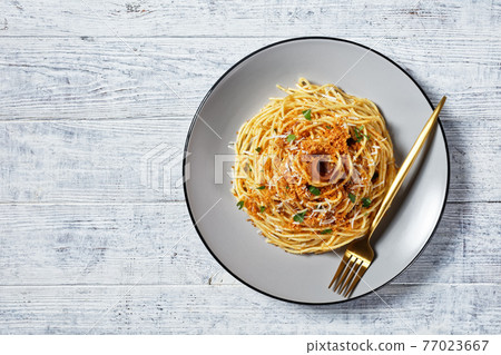 Pasta mollicata on a white table, copy space Pasta mollicata on a white table, copy space 77023667